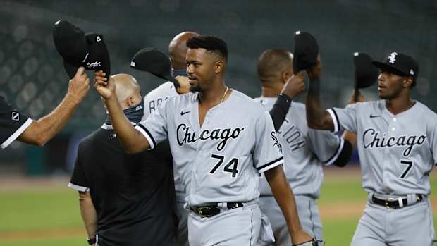Eloy Jiménez and Tim Anderson postgame v DET 2020-08-11 (Raj Mehta) USATSI_14728307 USATSI_14729001